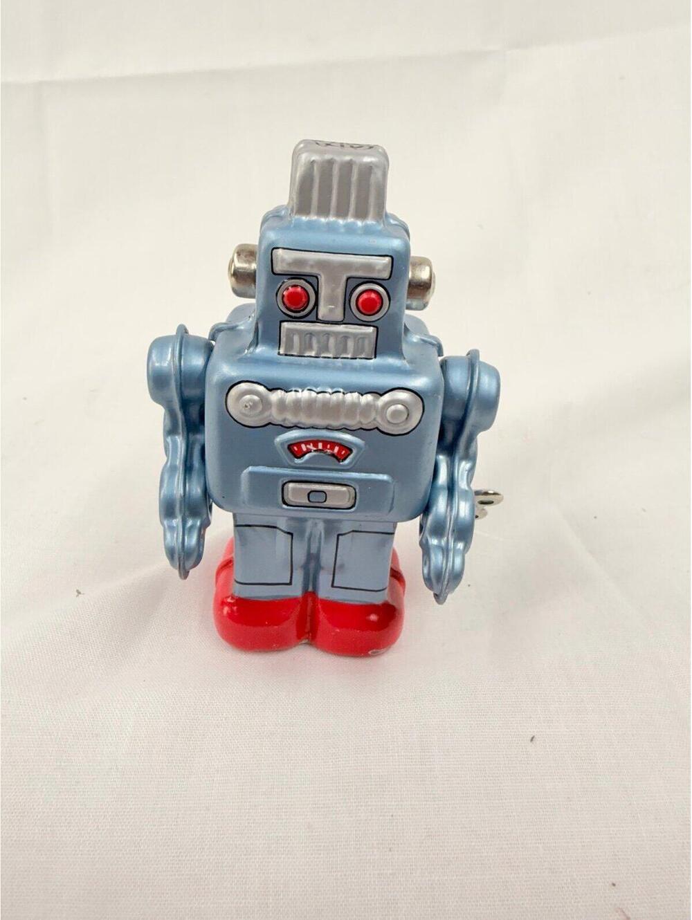 Tin robot with spring mechanism, roll-up robot, blue red made in Japan working